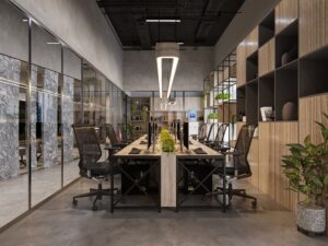Bureau minimaliste avec des murs en verre et des étagères, créant une atmosphère élégante et ouverte pour le travail collaboratif.